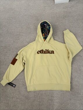 NWT ethika Pale Yellow Hoodie with Brown Logo and Printed Inner Hood